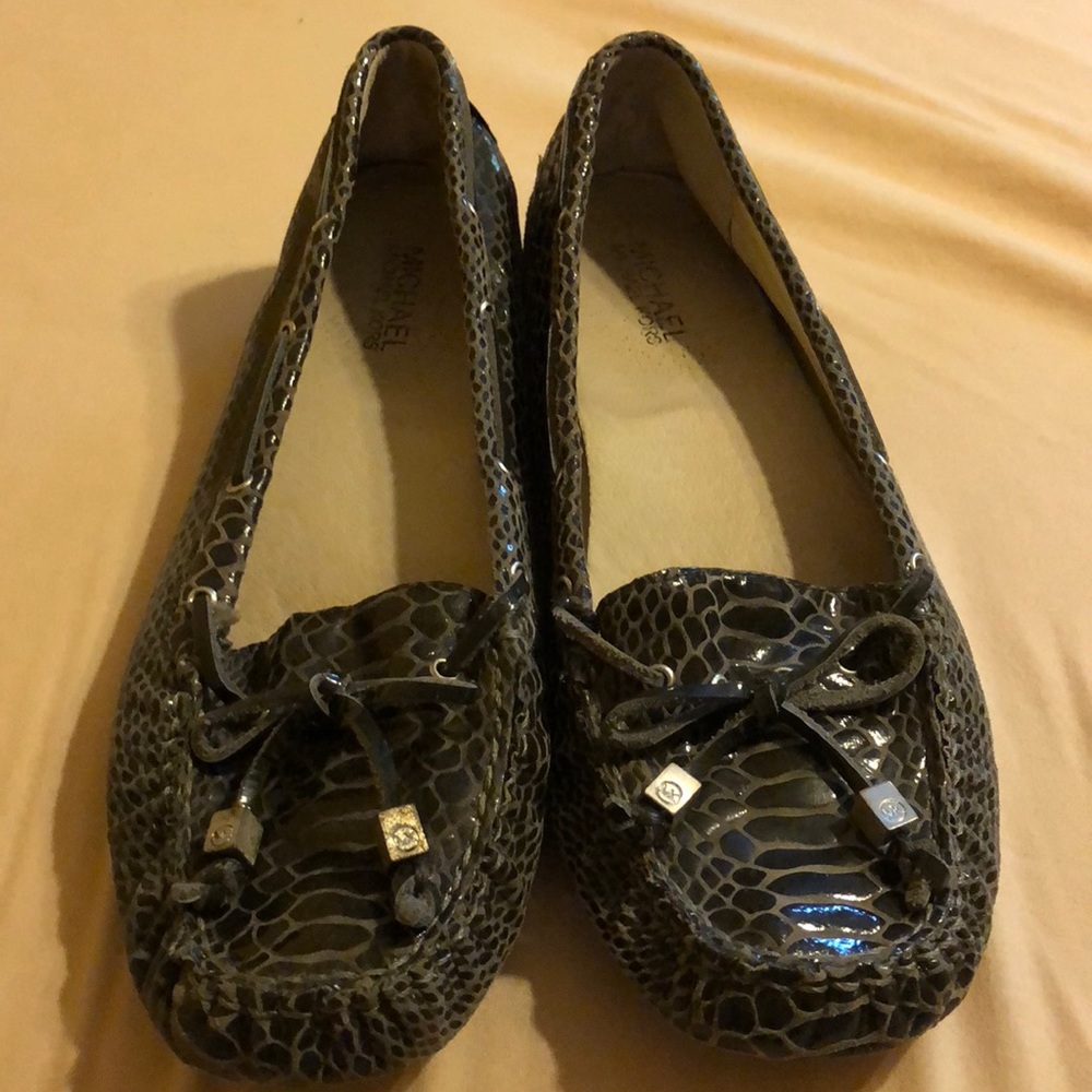 Michael Kors slip on loafers.